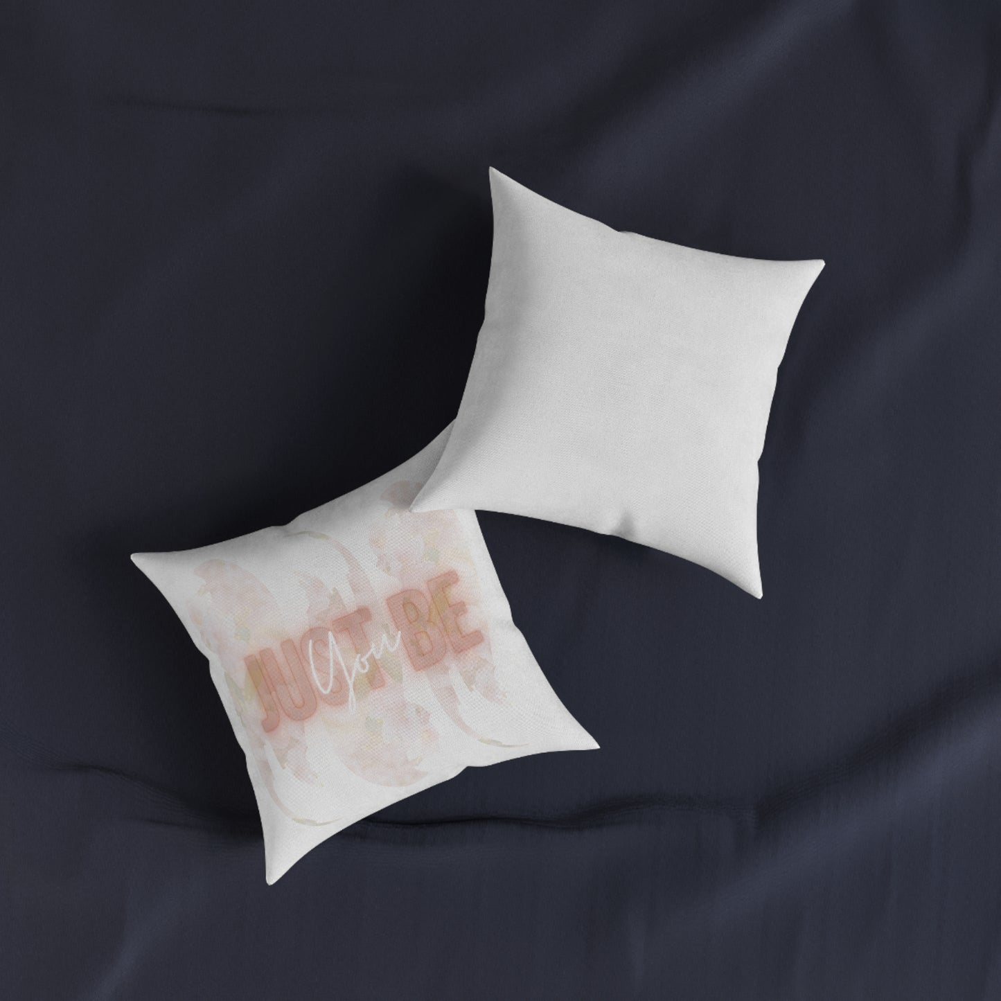 Two decorative pillows with watercolor design "Just_Be_You" on a dark fabric background, Polypropylene (Faux Suede) cover and polyester filling with concealed zipper